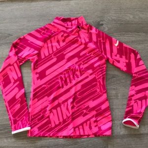 Nike pro pink 1/4 side neck zip.